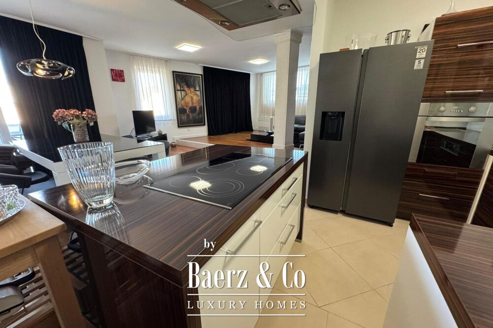 Brač, Bol, luxury penthouse in the town centre and building plot with building permit image