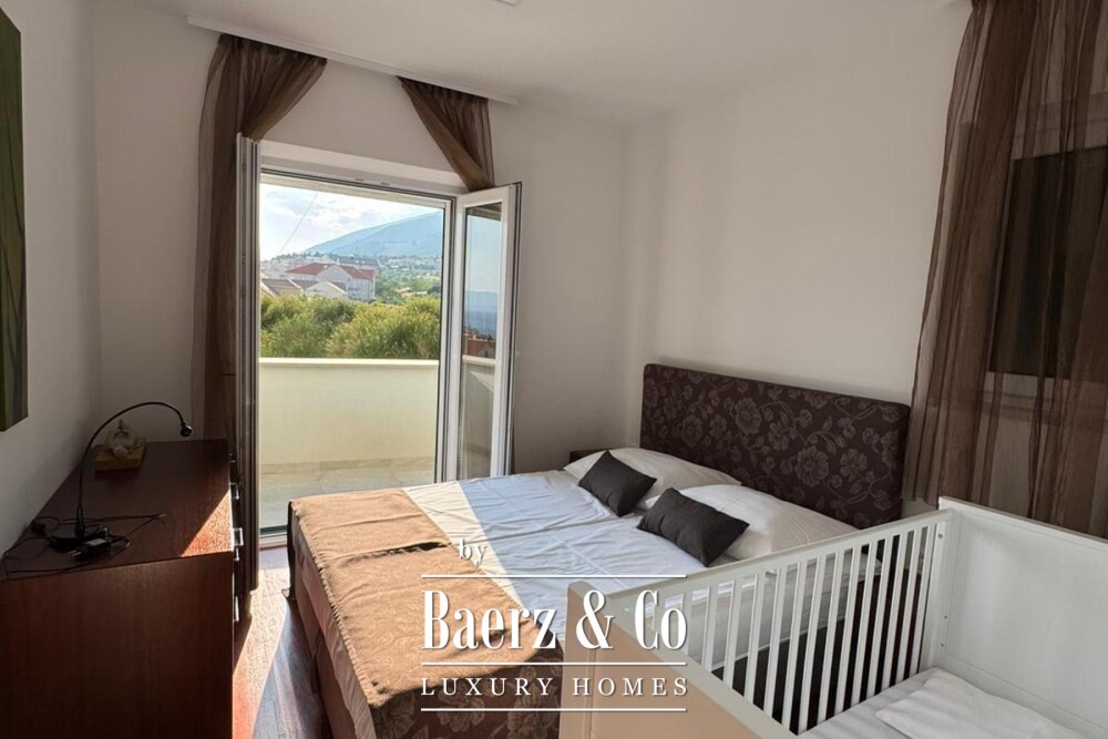 Brač, Bol, luxury penthouse in the town centre and building plot with building permit image