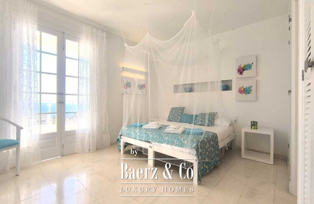 EXCLUSIVE MEDITERRANEAN VILLA WITH HEATED SWIMMING POOL, TOURIST LICENCE AND SPECTACULAR SEA VIEWS IN SANTO TOMÁS, MENORCA image