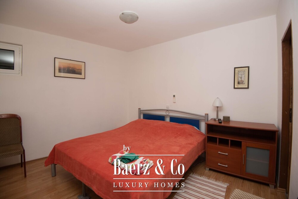 Tisno, exclusive seafront apartment house with panoramic sea views and a boat image