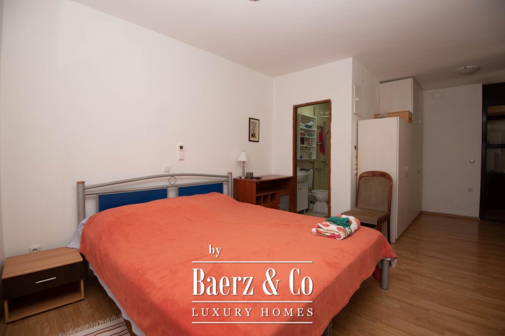 Tisno, exclusive seafront apartment house with panoramic sea views and a boat image