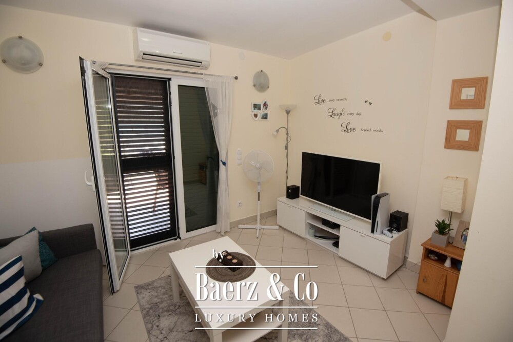 Tisno, exclusive seafront apartment house with panoramic sea views and a boat image