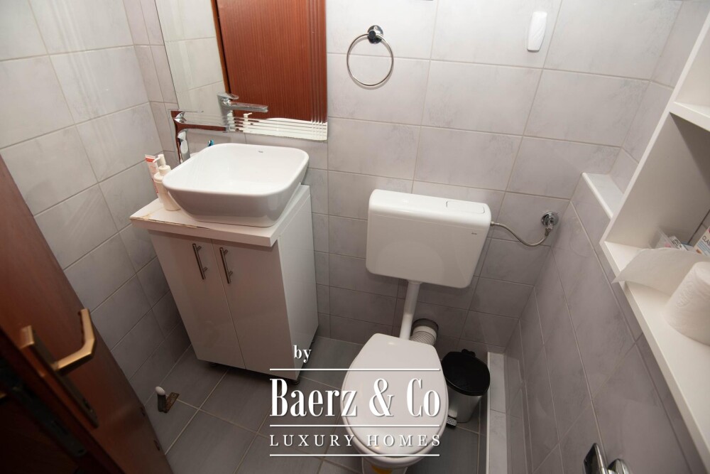 Tisno, exclusive seafront apartment house with panoramic sea views and a boat image