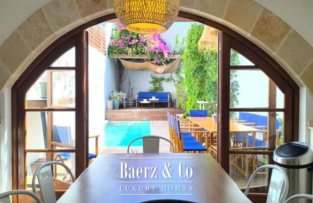 RENOVATED MENORCAN HOUSE FOR SALE IN THE HISTORIC OLD TOWN OF CIUTADELLA, MENORCA – COURTYARD WITH SWIMMING POOL, 4 EN-SUITE BEDROOMS AND ORIGINAL ARCHITECTURAL FEATURES image