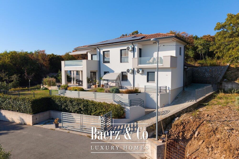 Kostrena, a house with a swimming pool and a stunning open sea view image