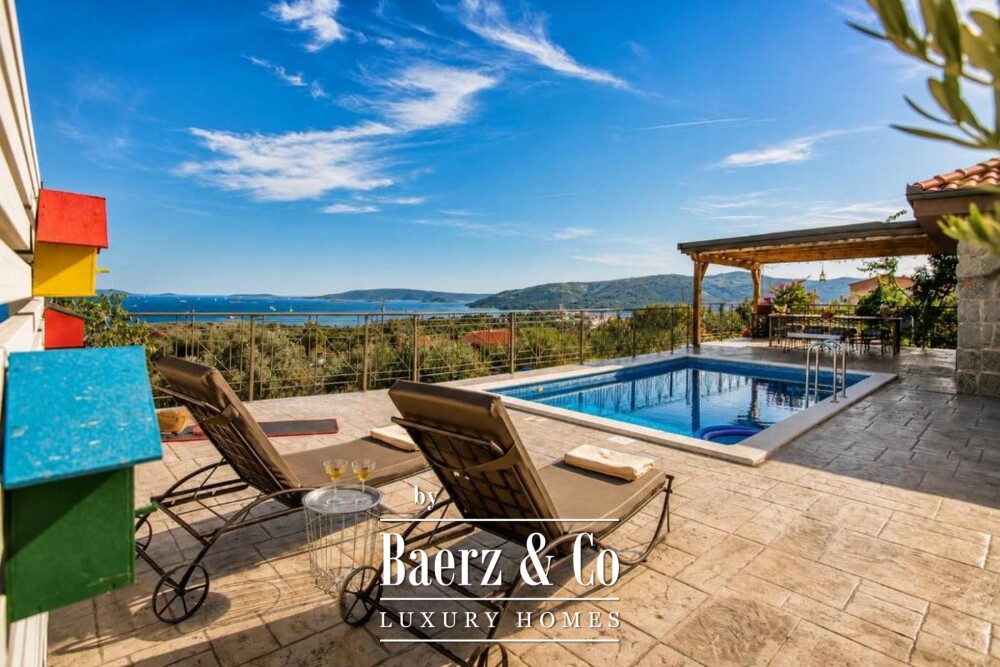Trogir area, stone villa with a swimming pool and a Mediterranean garden image